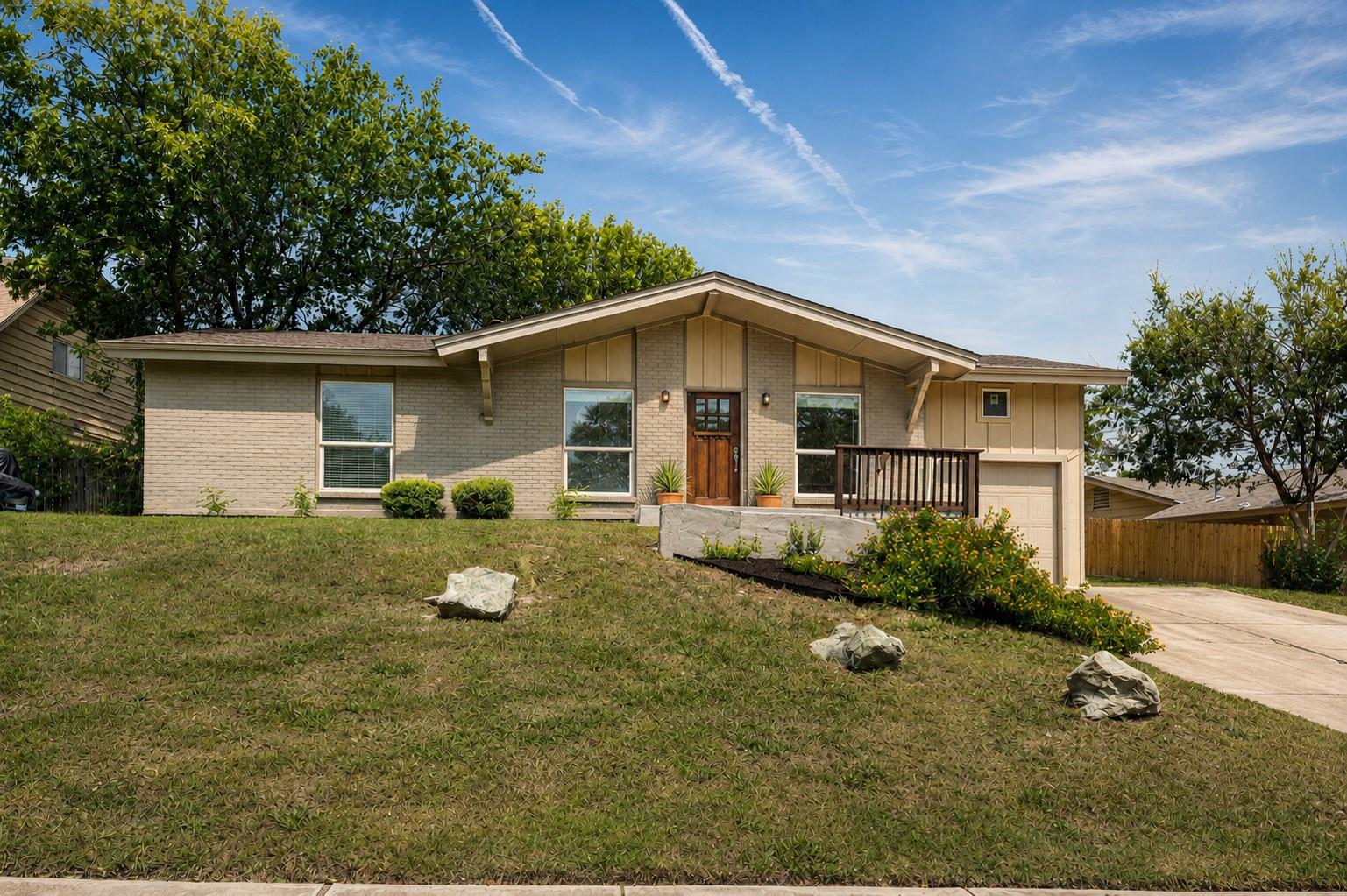 A classic ranch-style residence welcomes you with