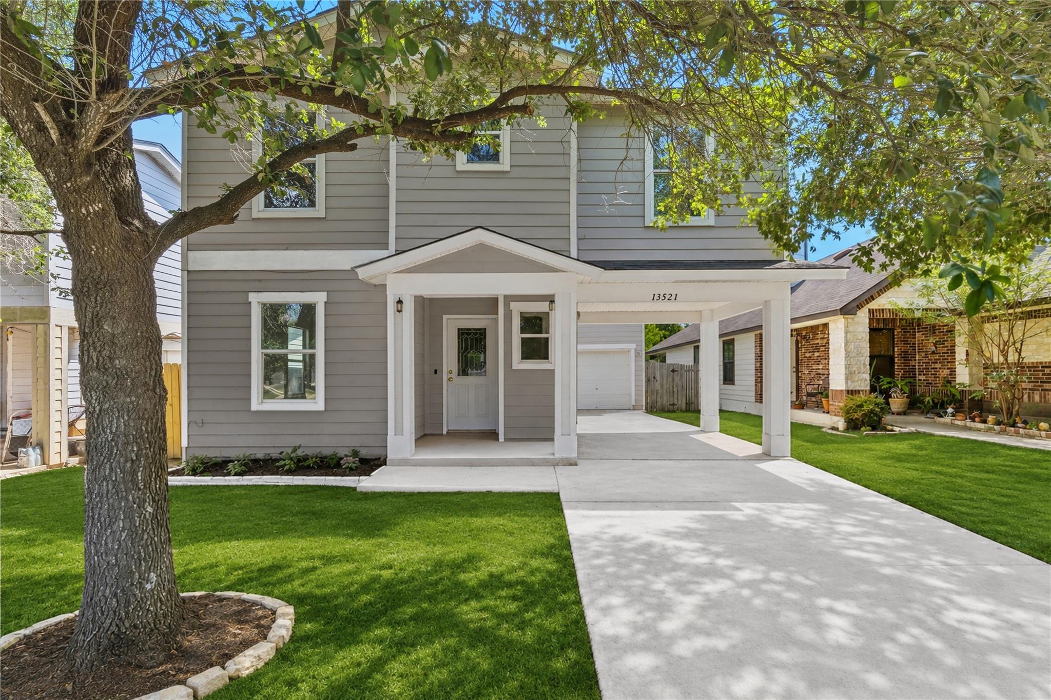 A well-maintained facade with fresh landscaping w