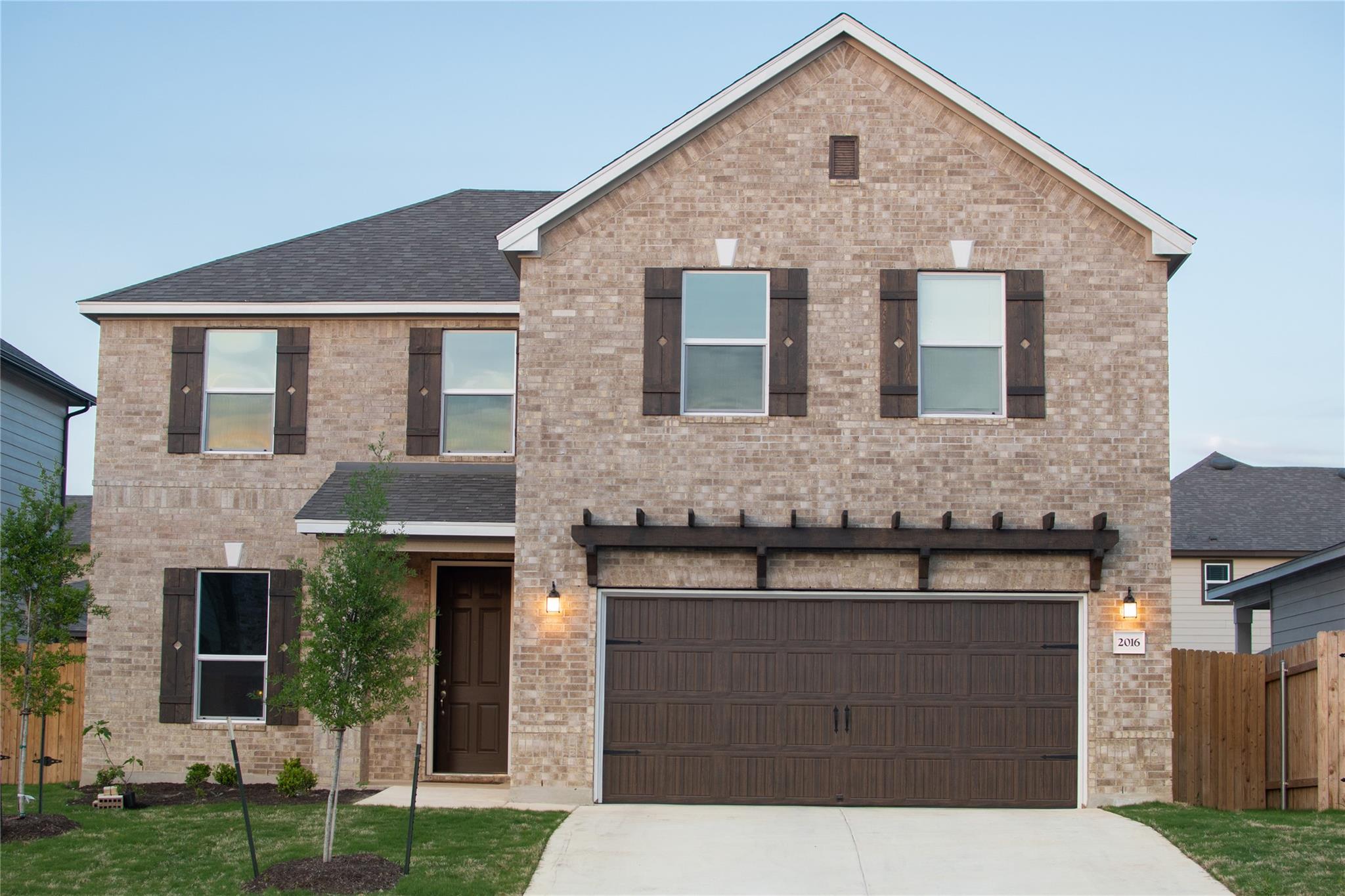 A classic brick facade provides a welcoming entry