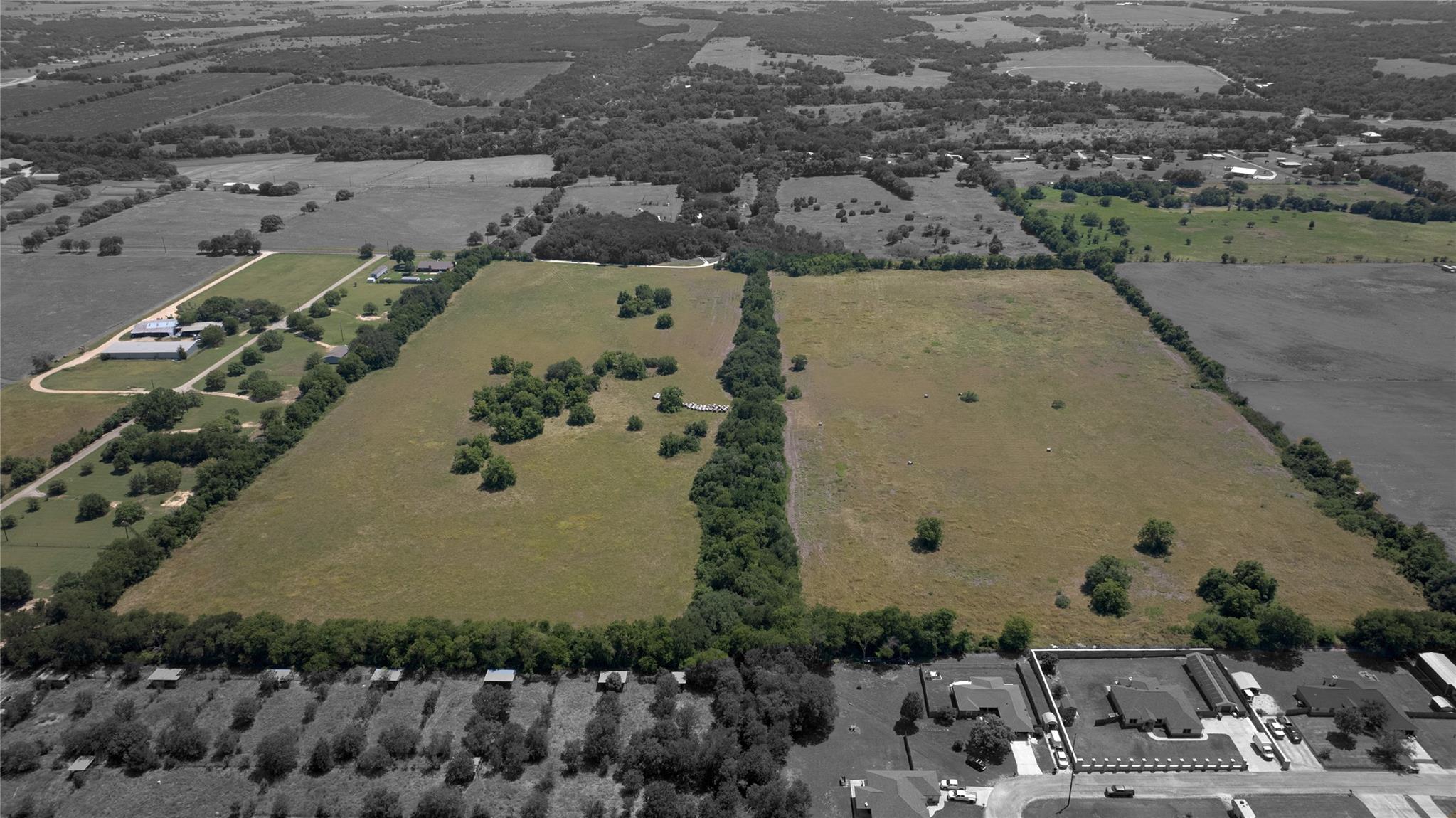 An aerial perspective reveals vast, open fields b