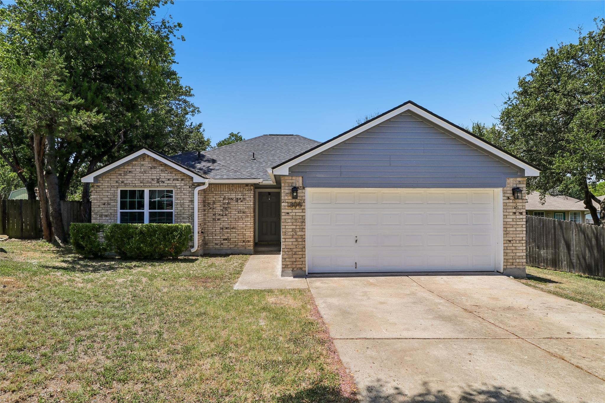 A classic brick exterior with a welcoming entrywa