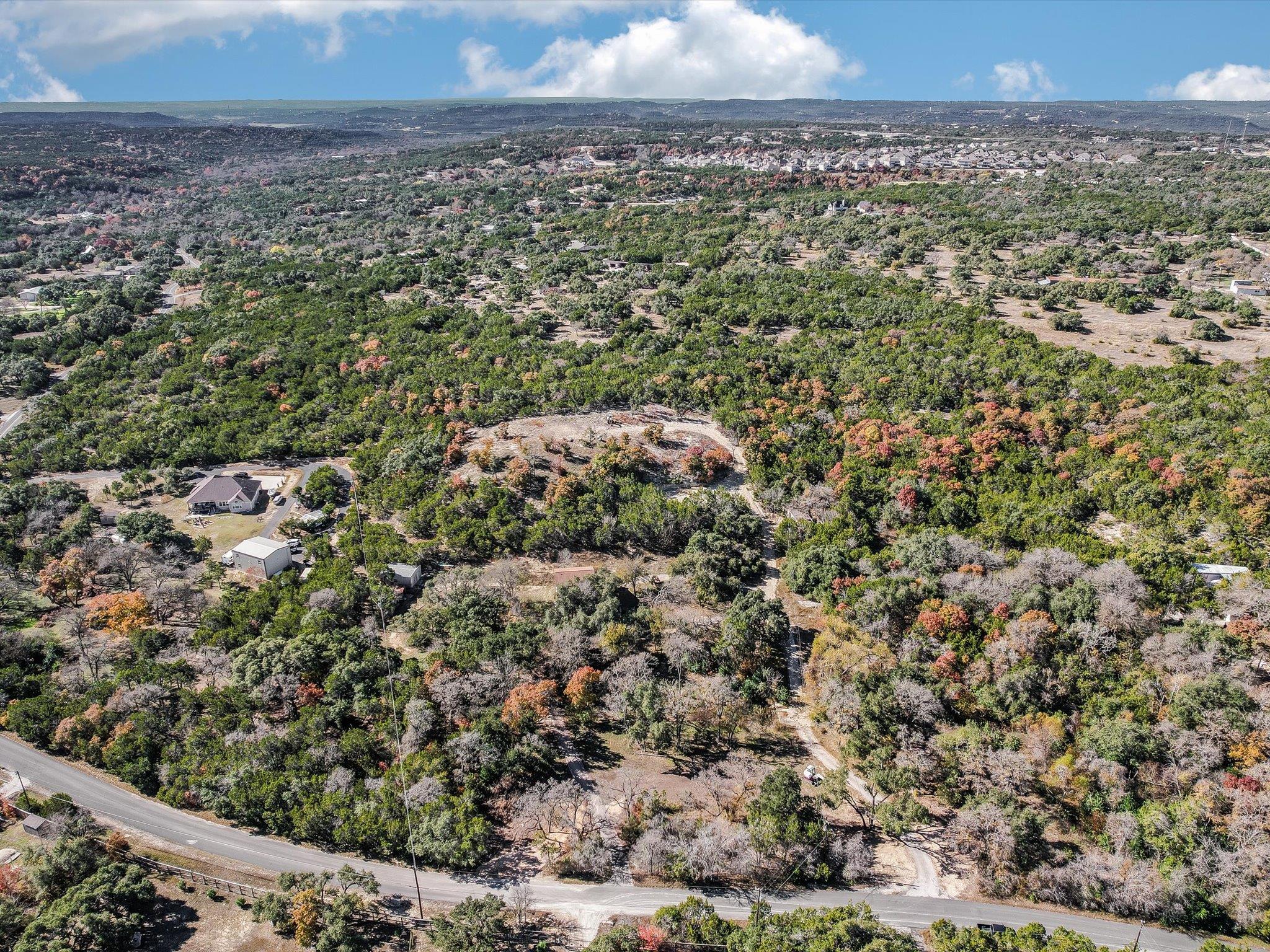 A sweeping aerial view reveals a verdant landscap