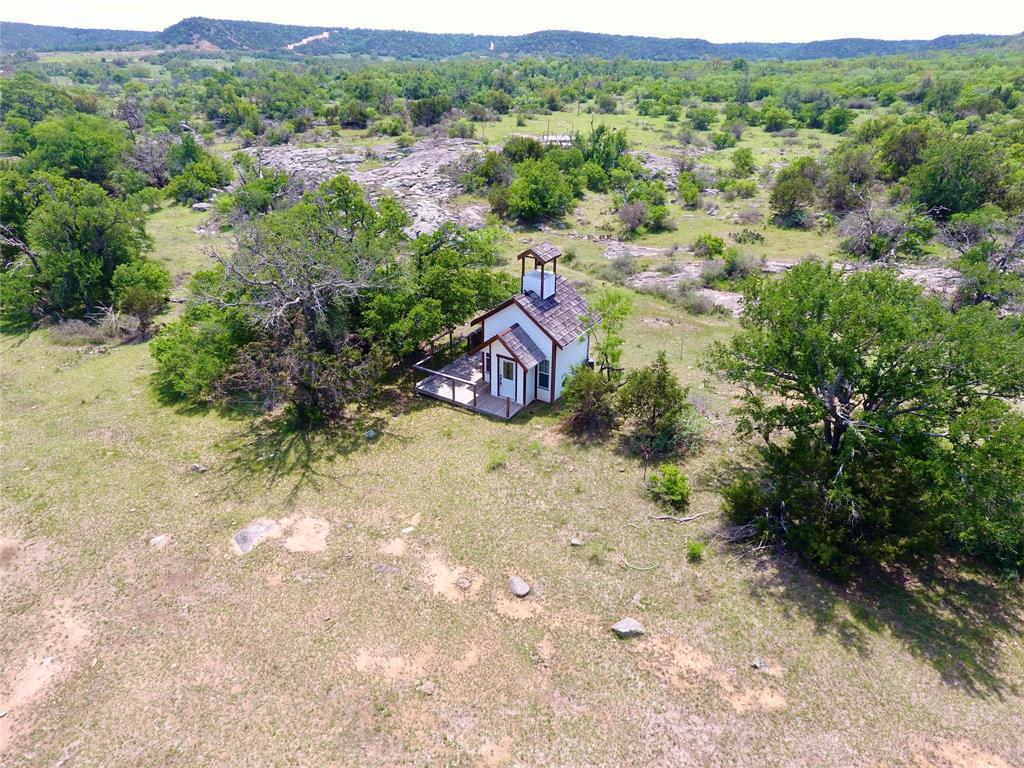 Nestled among trees, a charming small structure o