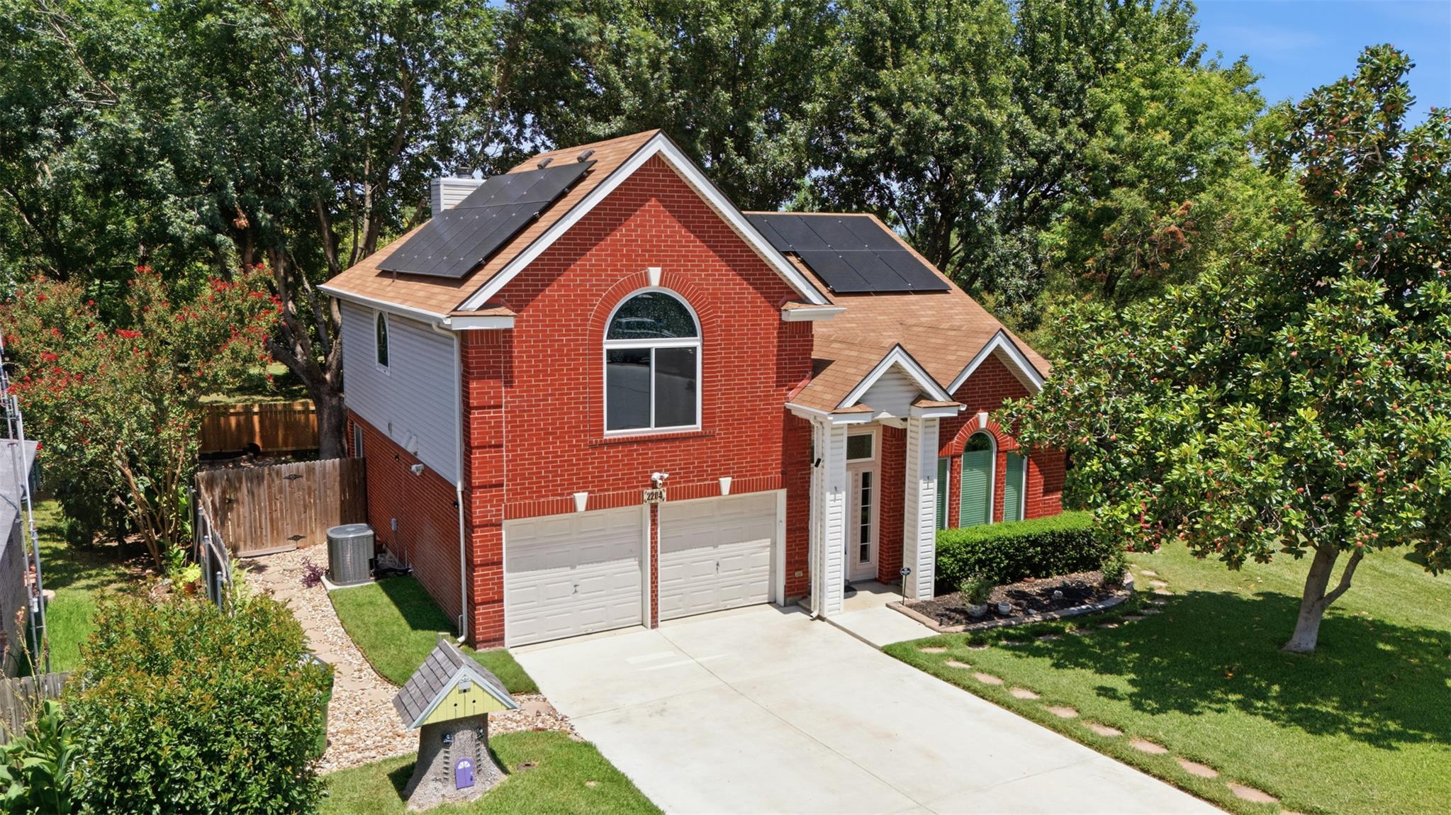 A classic brick exterior with a welcoming entrywa