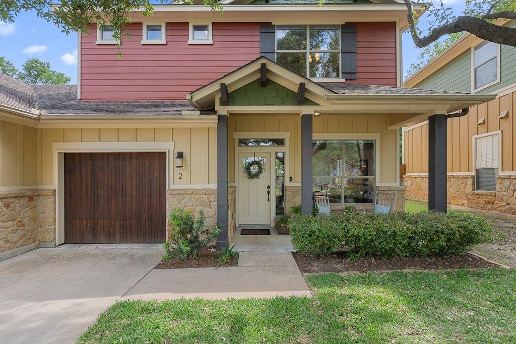 Multi-level exterior featuring a covered porch, s