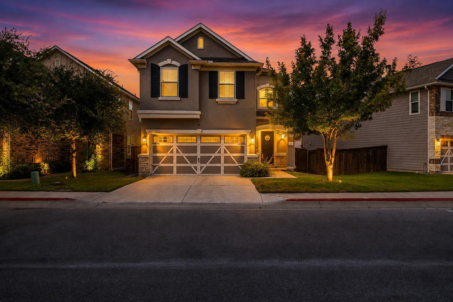 Illuminated by a vibrant sunset, this inviting re