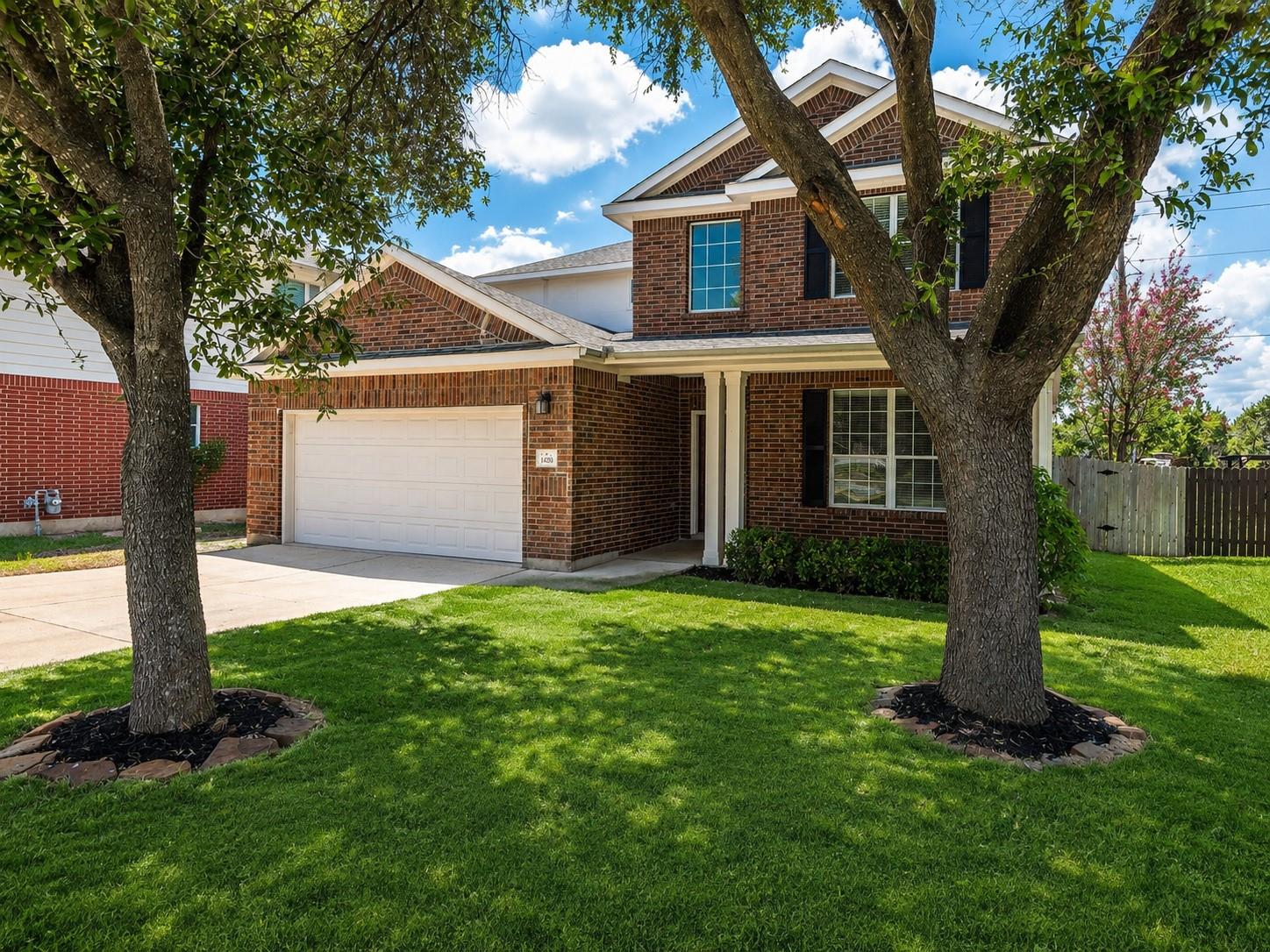 A classic brick exterior with well-maintained lan