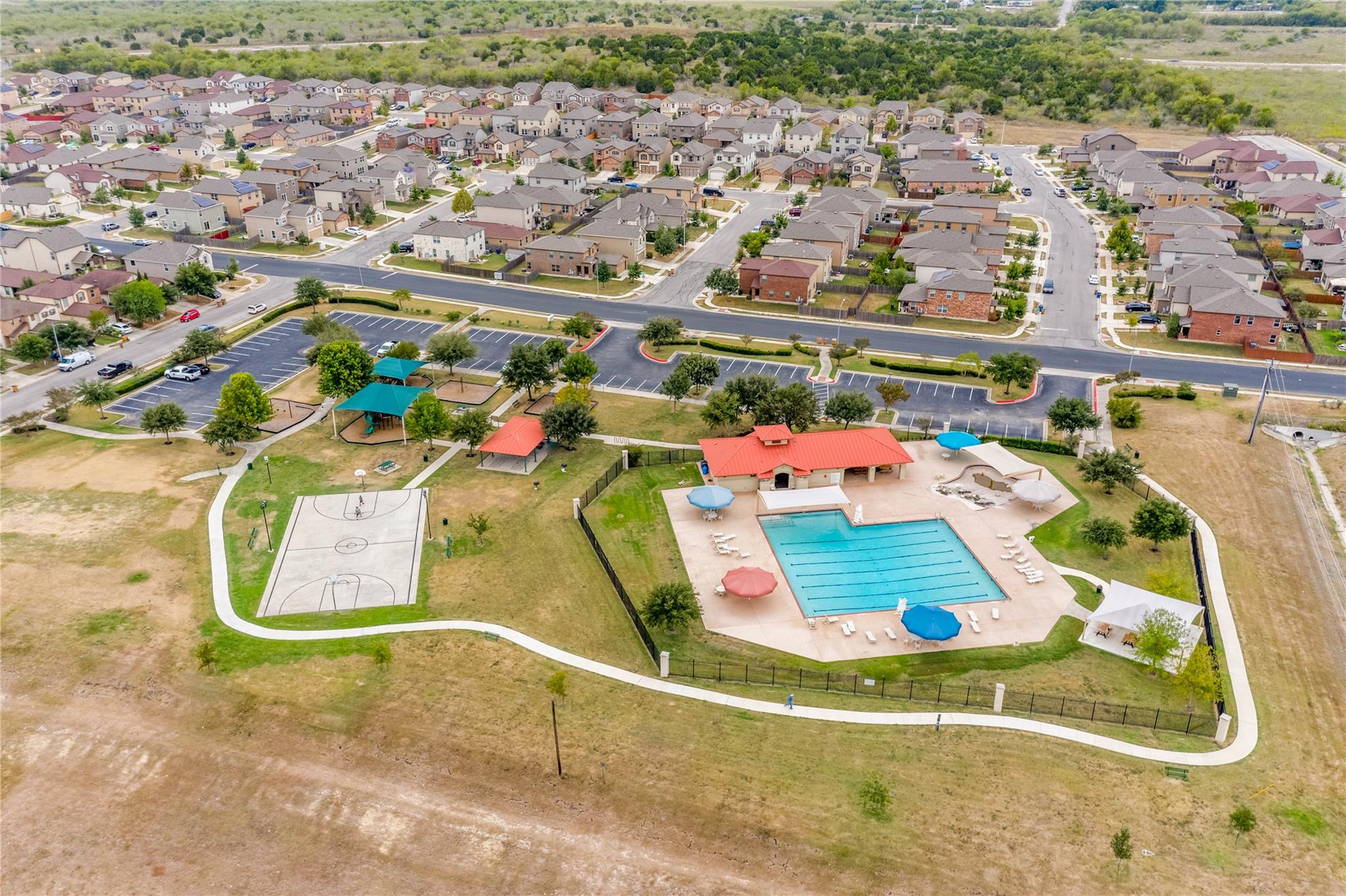 An aerial view showcases the neighborhood recreat