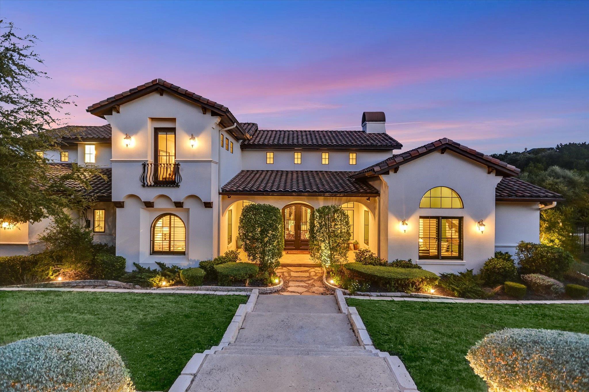 Stately stucco architecture and a classic tile ro
