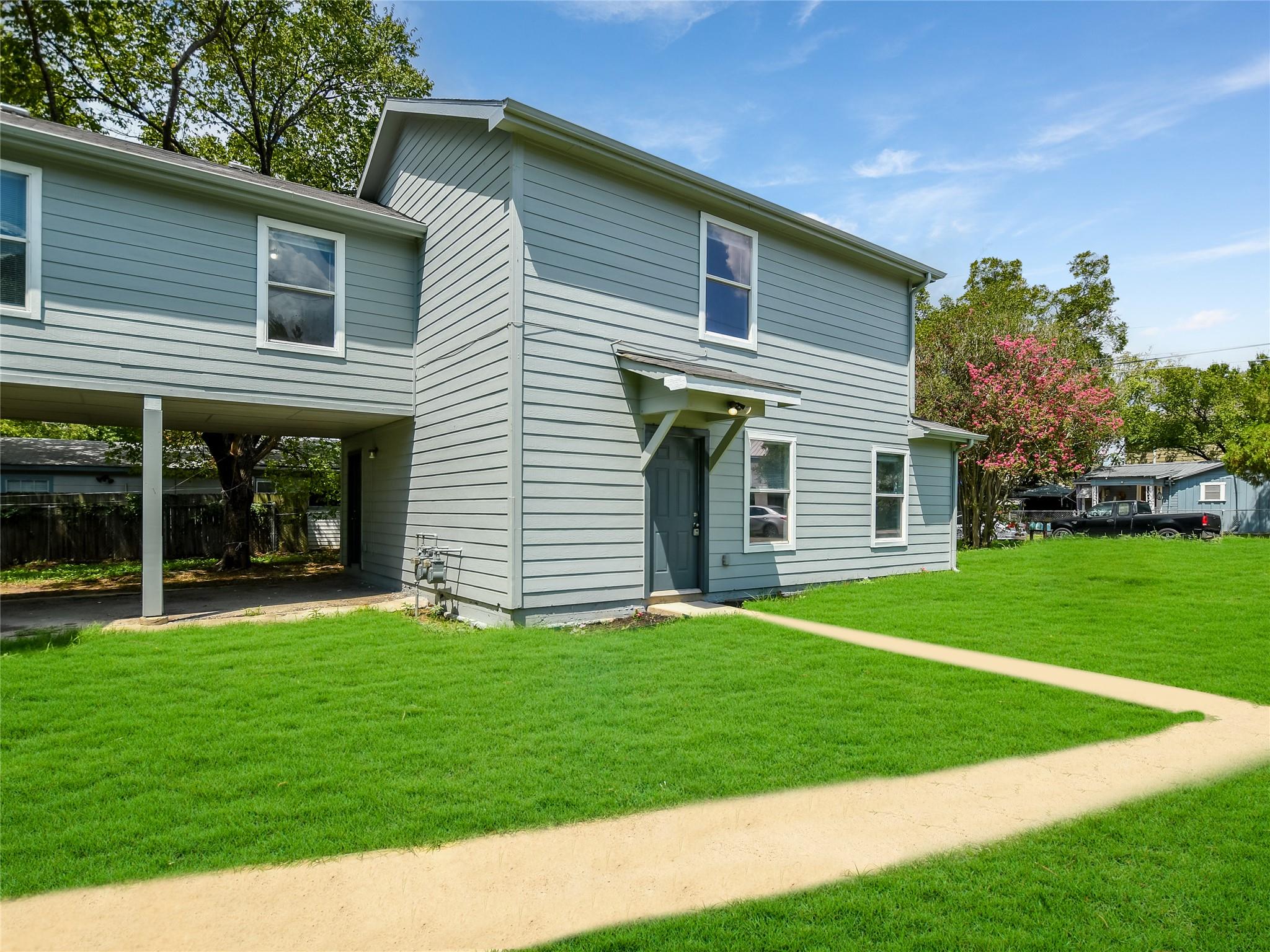 A well-maintained lawn welcomes you to this home 