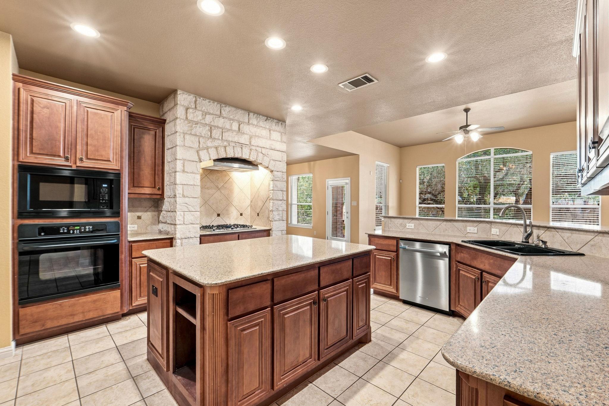 A well-appointed kitchen showcases an expansive i