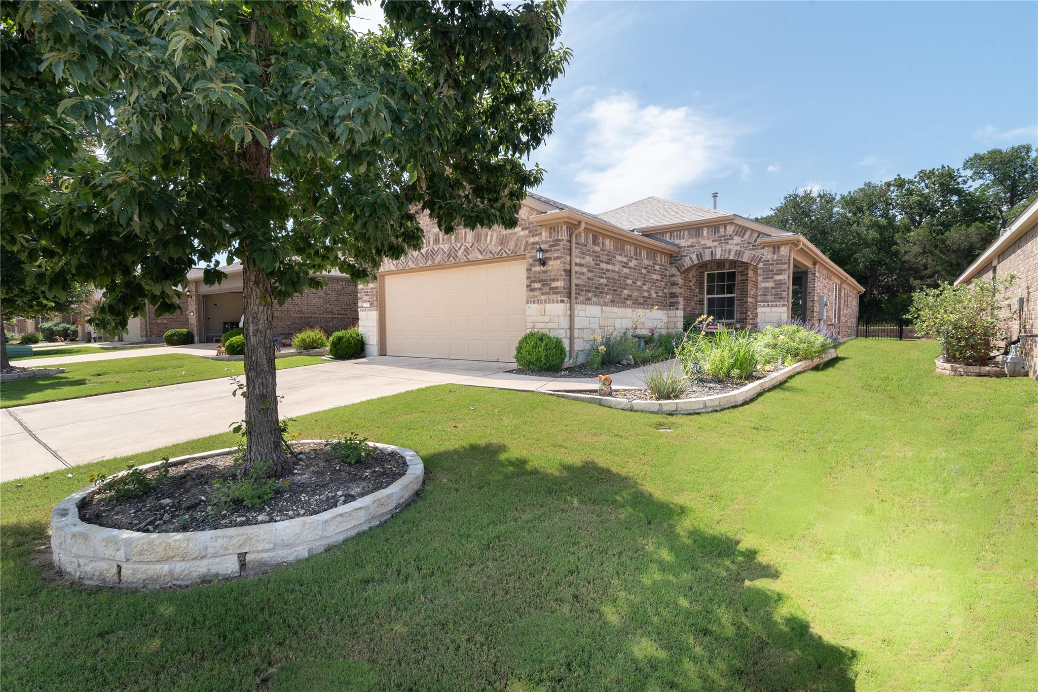 A well-maintained front yard offers appealing cur
