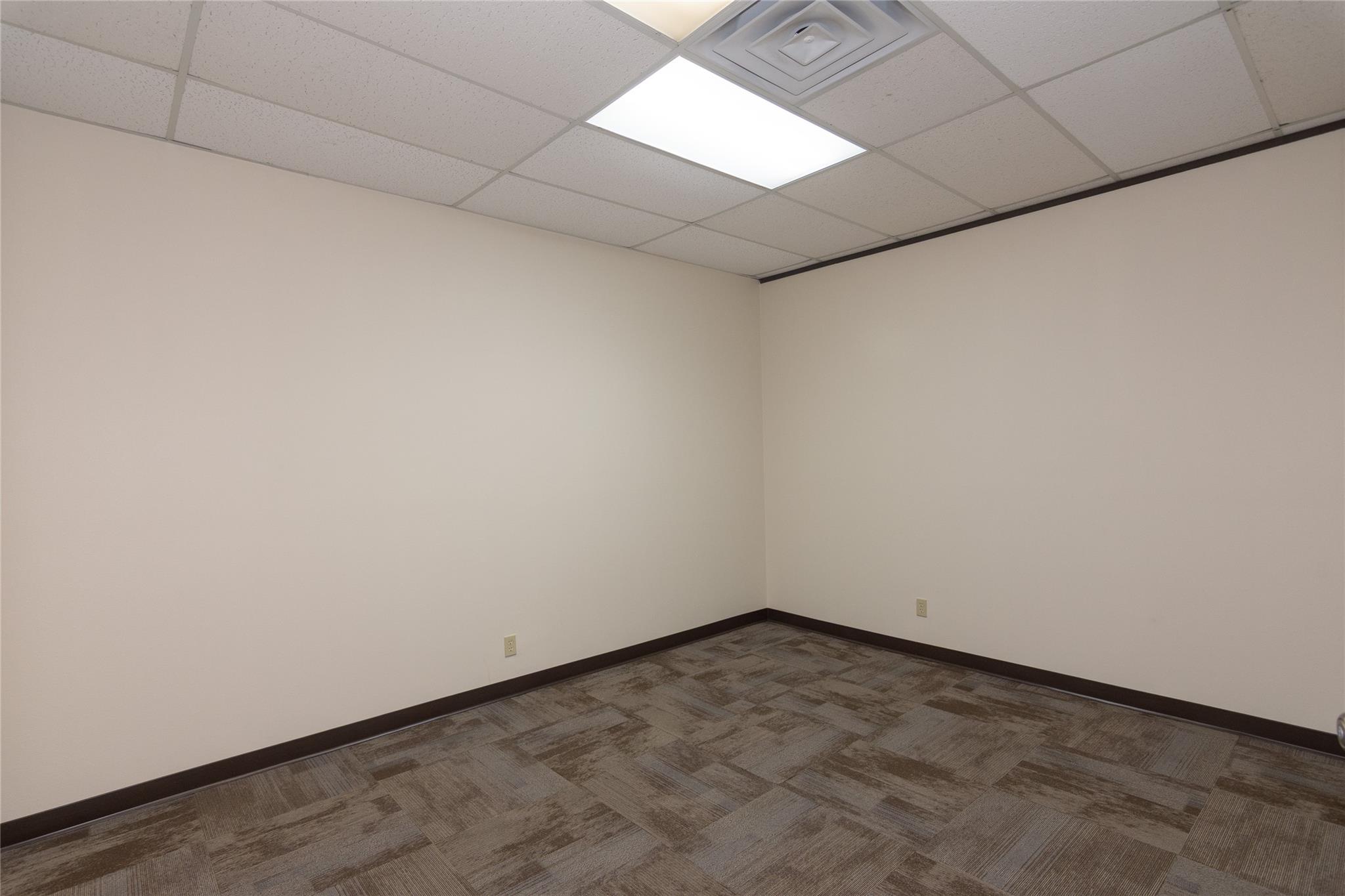 An adaptable, empty room awaits your personal tou