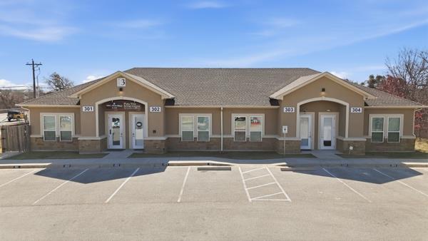 A commercial property featuring a split facade wi