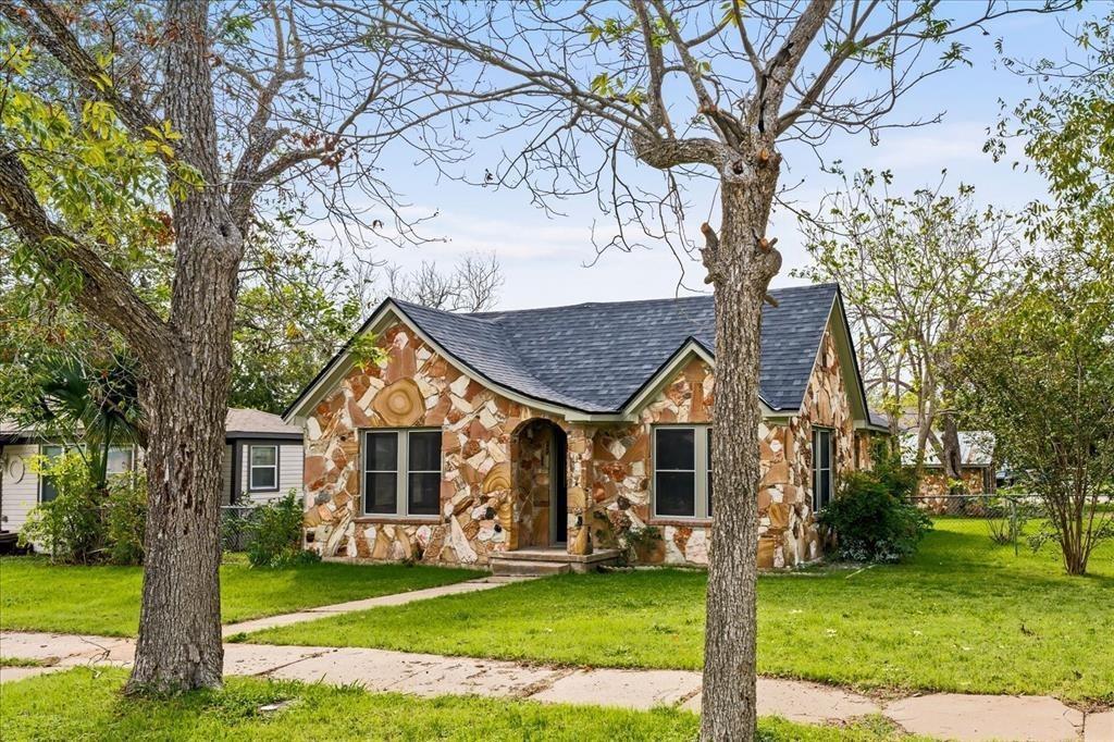 A charming, single-story residence boasts unique 
