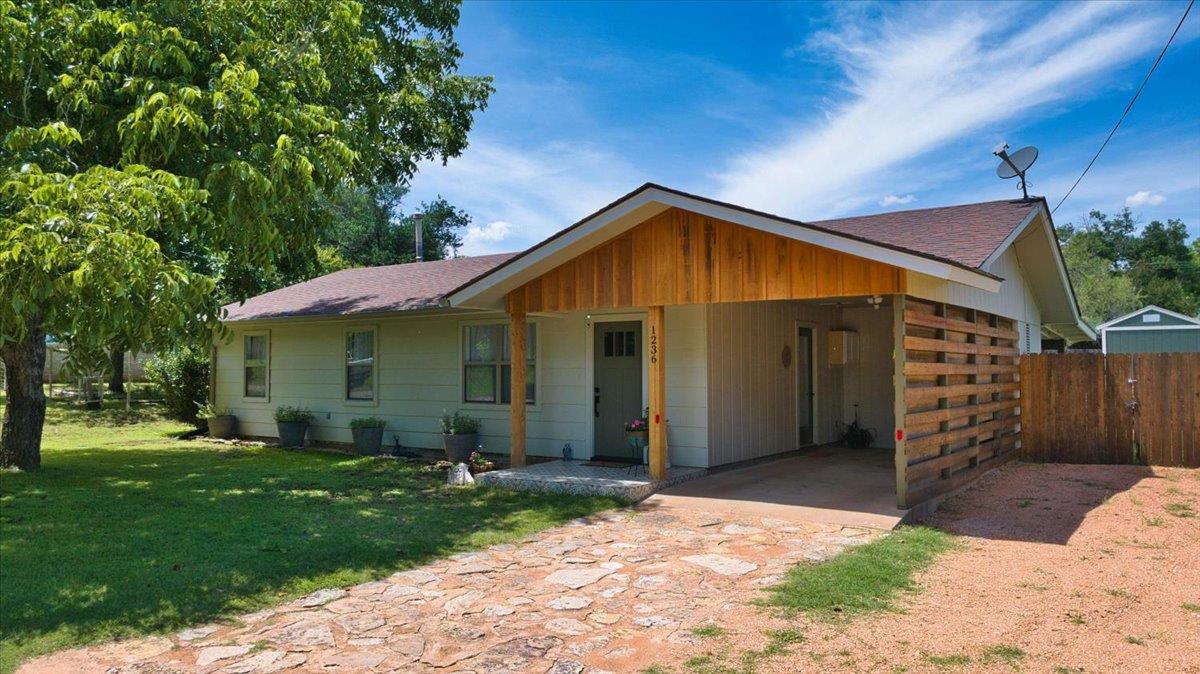 A charming single-story residence with a carport 