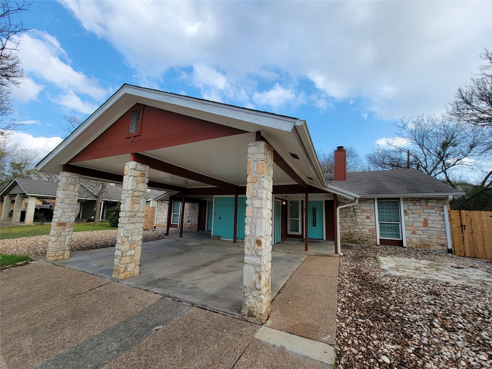 A charming stone facade home offers a practical c