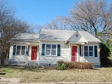 A charming cottage facade awaits, boasting vibran