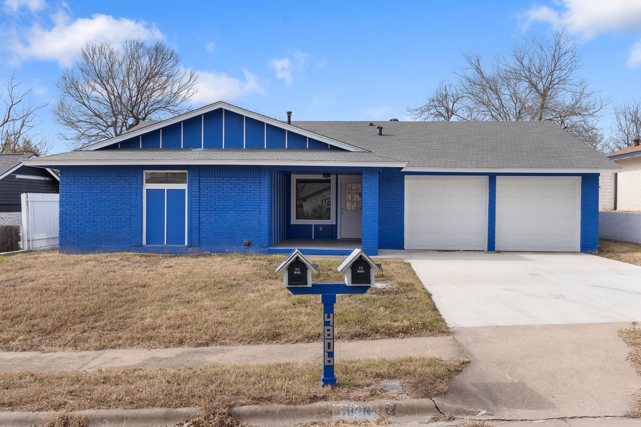 View of front of home featuring concrete driveway