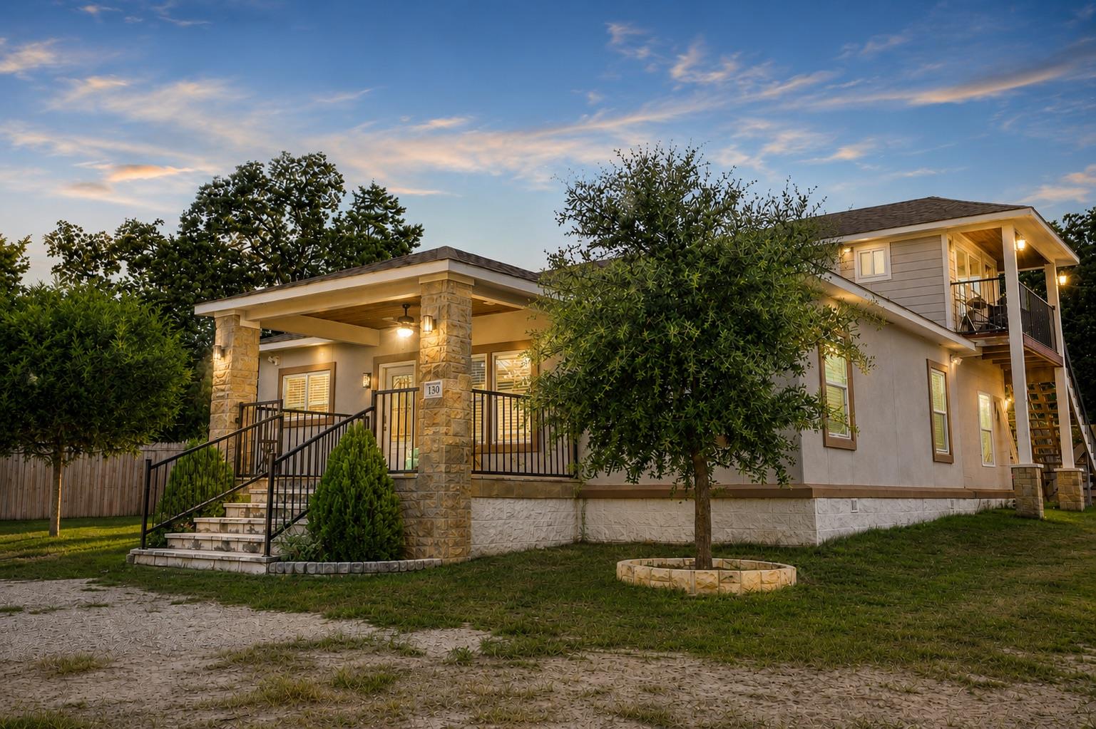 A welcoming front entrance with stone accents and