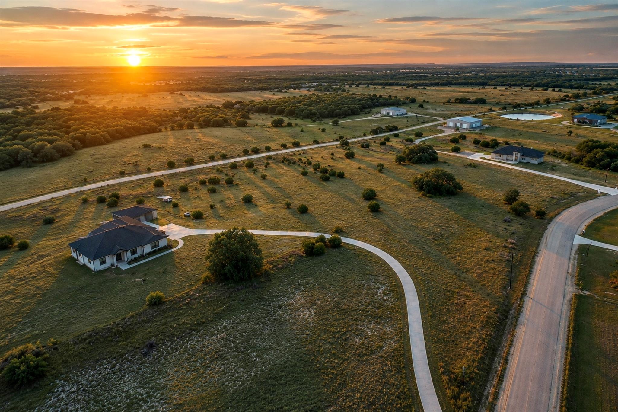 Golden hour illuminates sprawling lots with priva