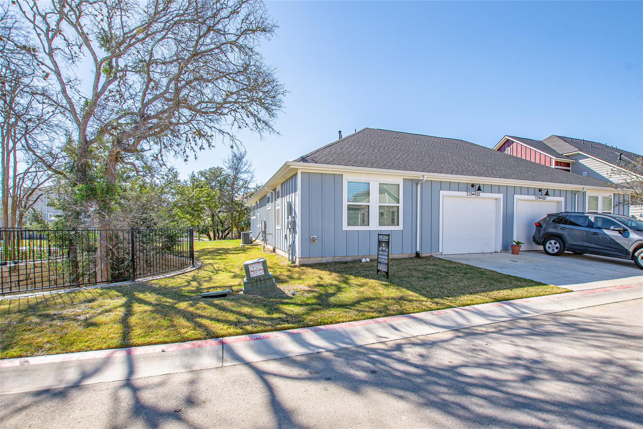 A welcoming front exterior offers curb appeal wit