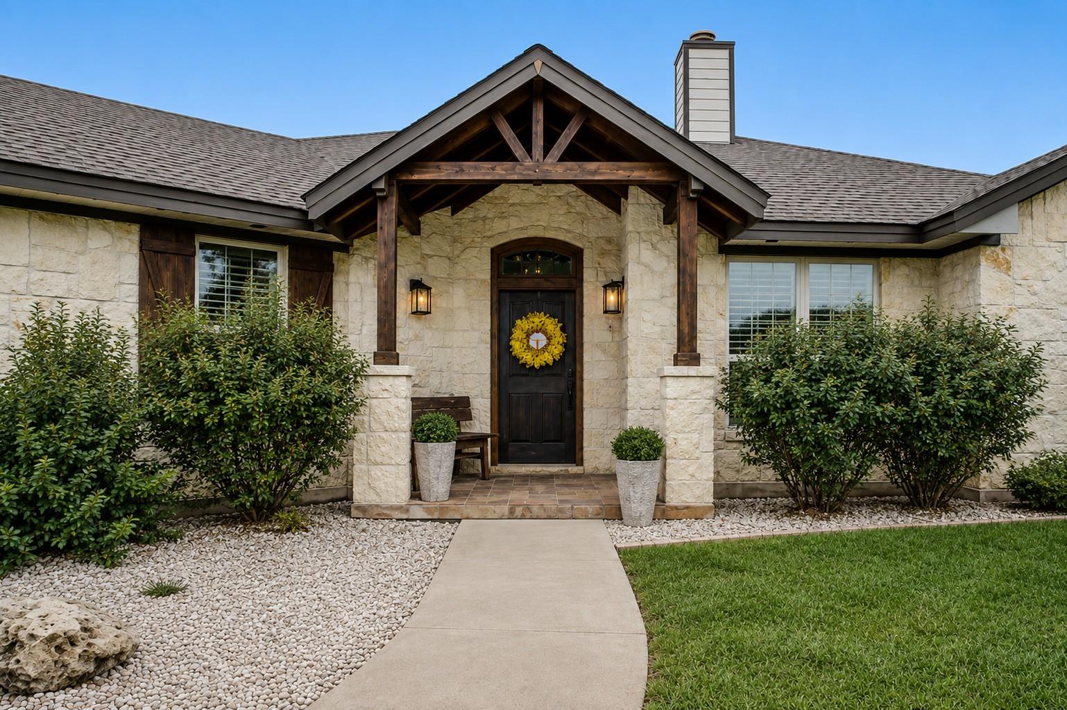A welcoming stone facade with a rustic timber-fra