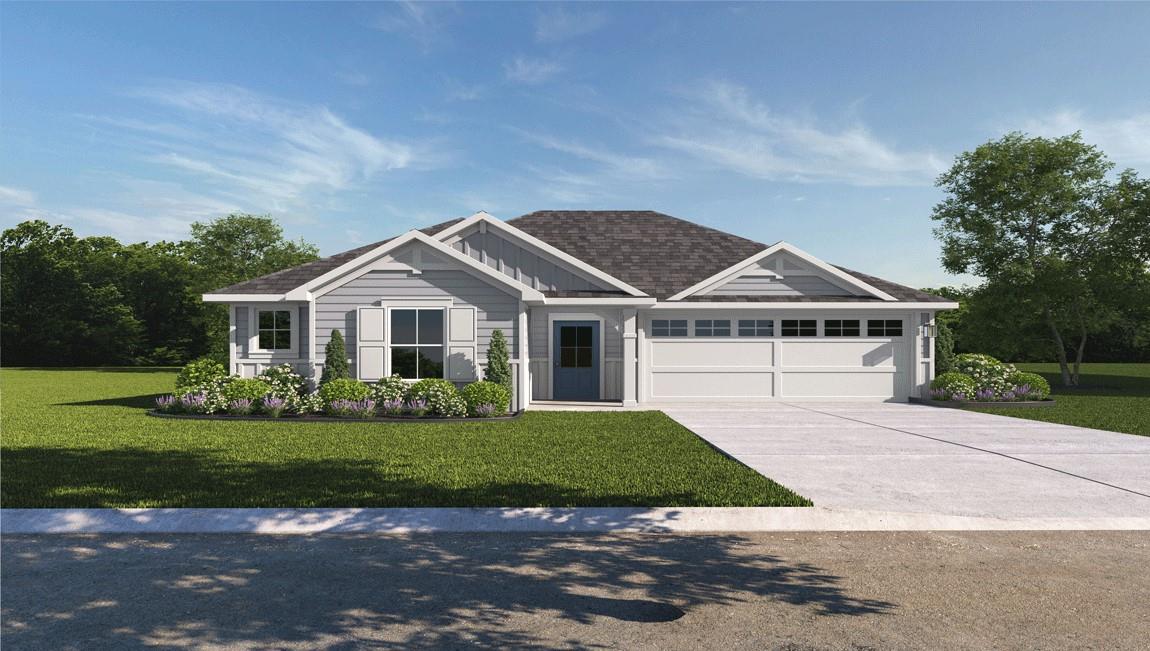 Well-maintained lawn with mature landscaping crea