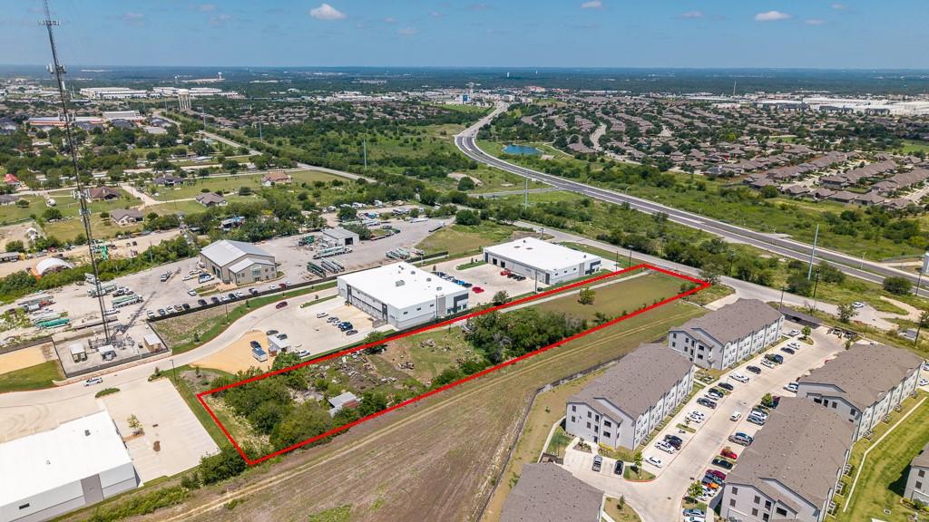 An aerial perspective reveals a prime development