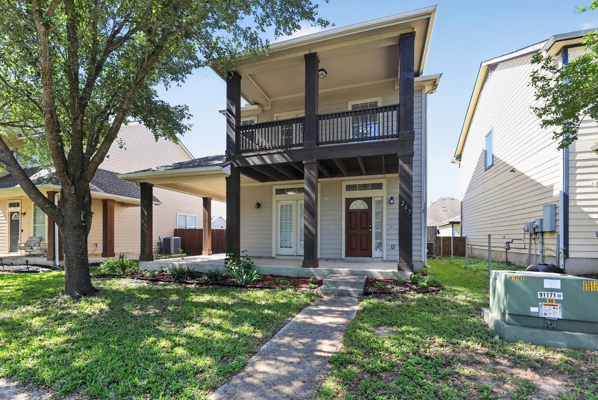 A welcoming front facade showcases a charming ele