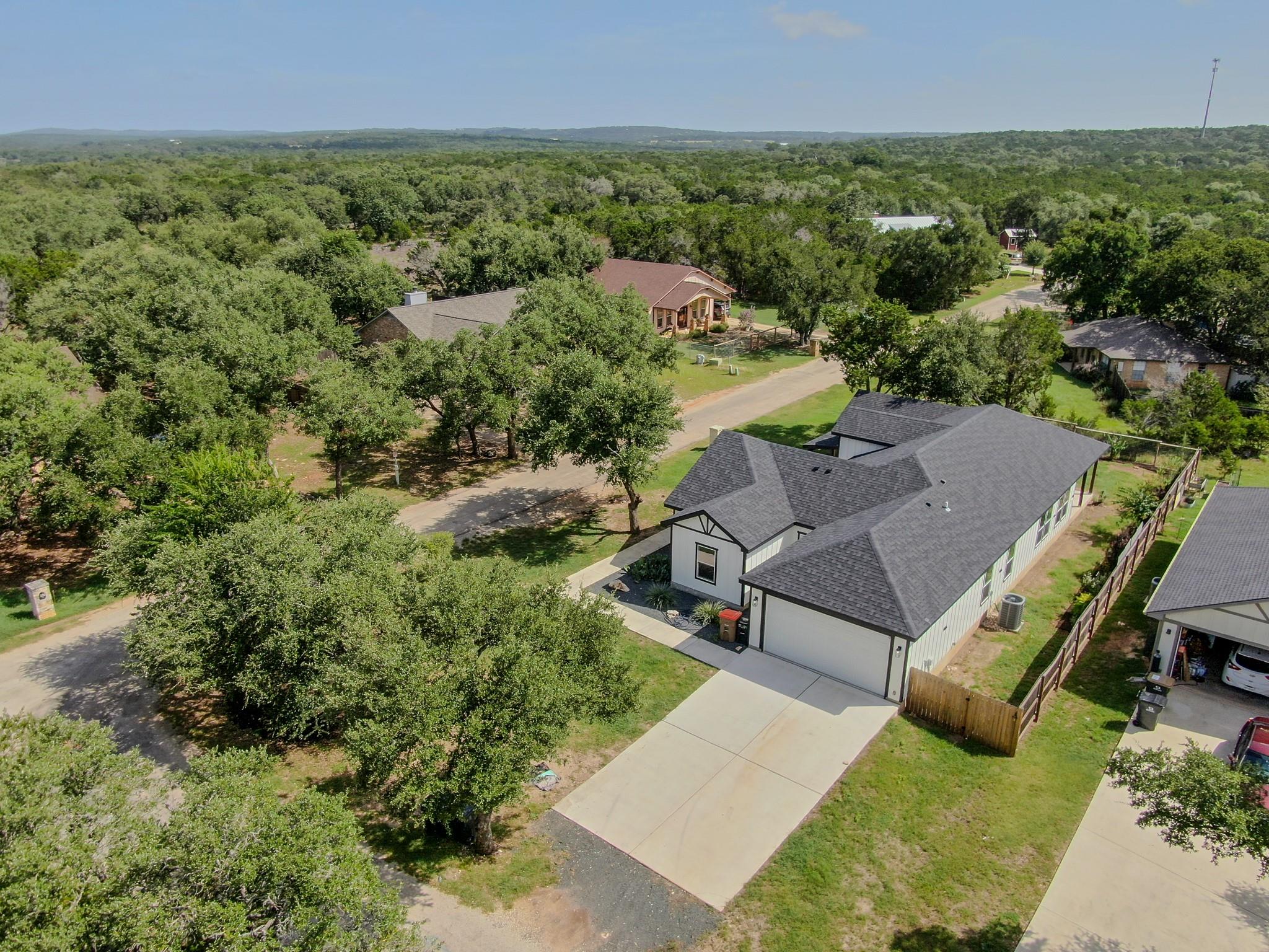 An aerial perspective reveals a charming residenc
