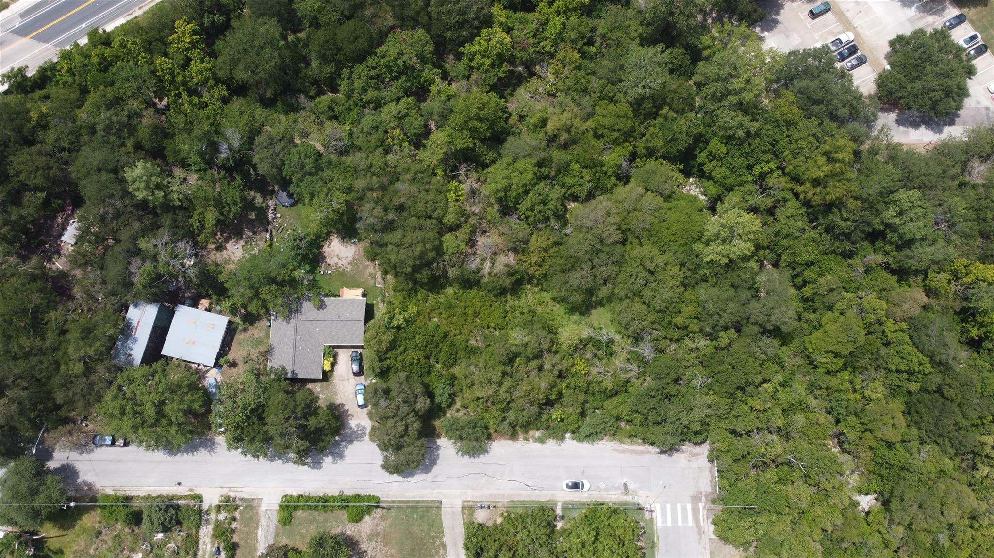 An aerial perspective reveals a secluded home nes