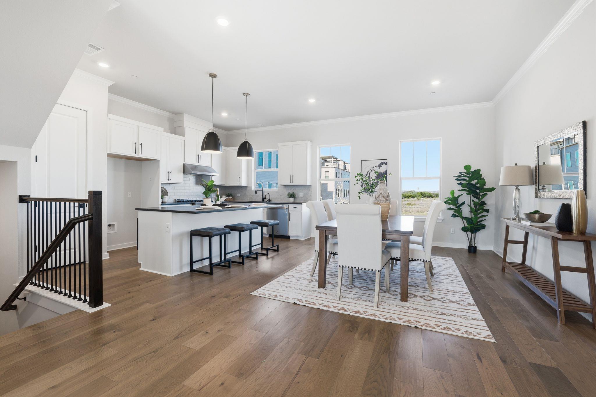 Dining room featuring crown molding, dark wood fi