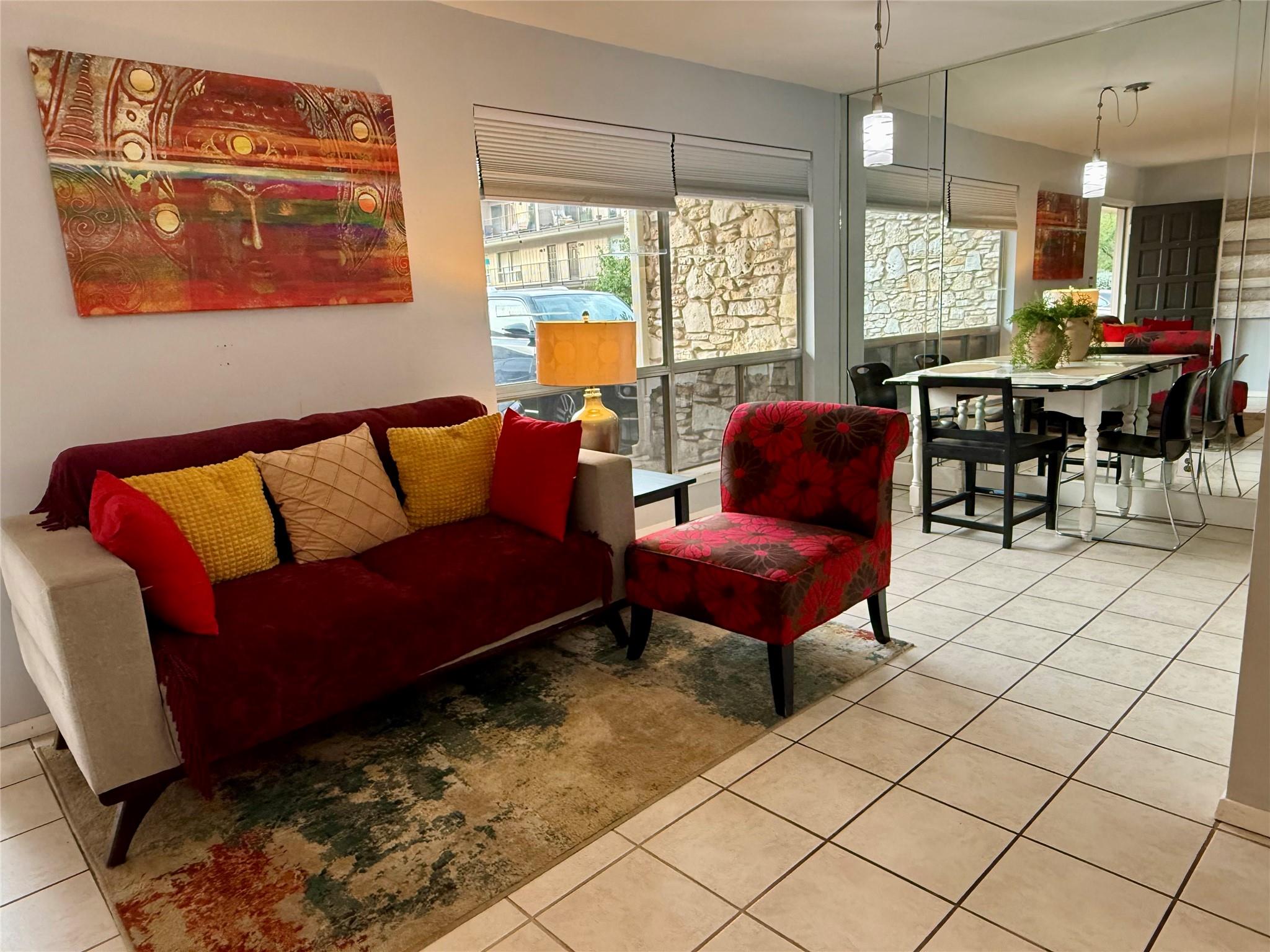 Ceramic tile flooring flows throughout this integ
