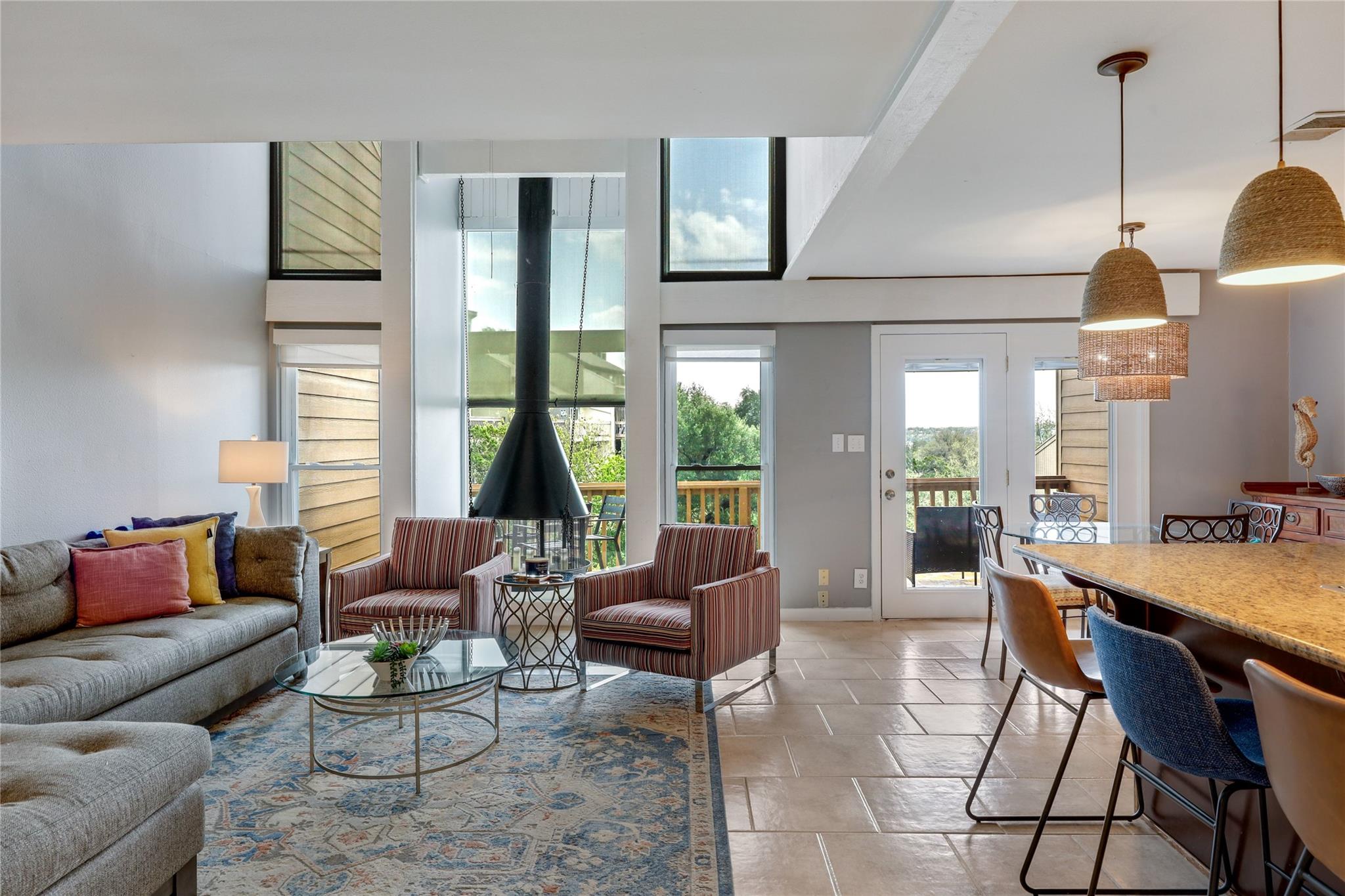 An open-concept living area flows into a kitchen 