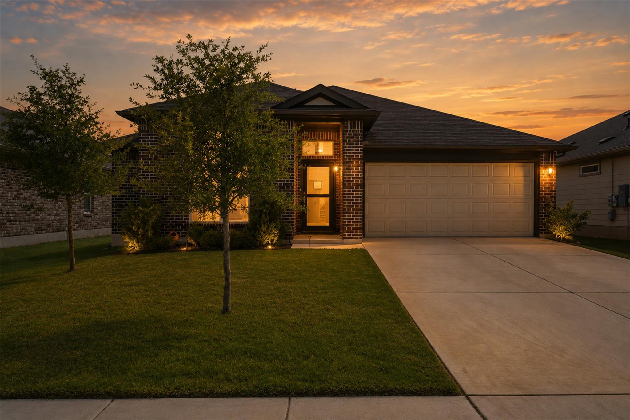 A welcoming brick exterior with a well-maintained