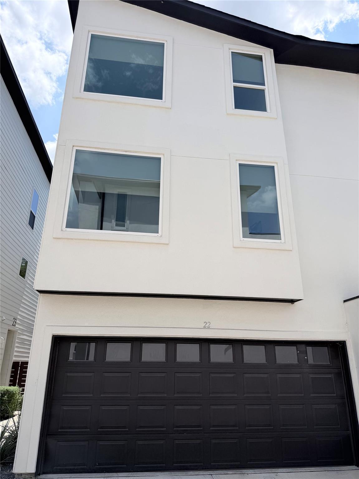 A modern facade with crisp lines and a prominent 