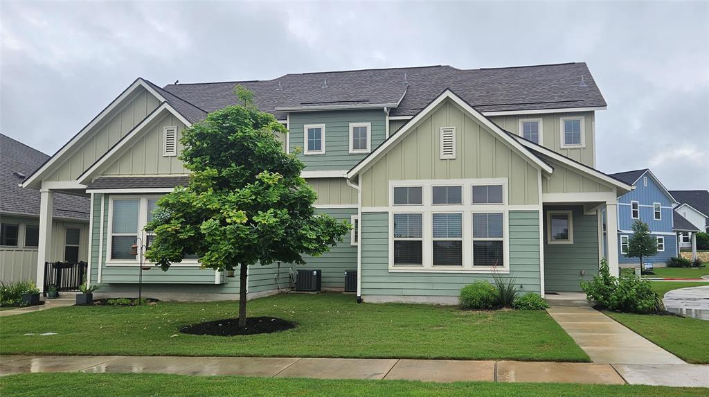 A fresh facade with contrasting siding and clean 
