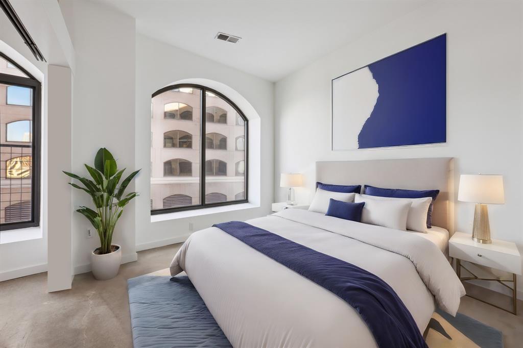 Natural light floods this inviting bedroom throug