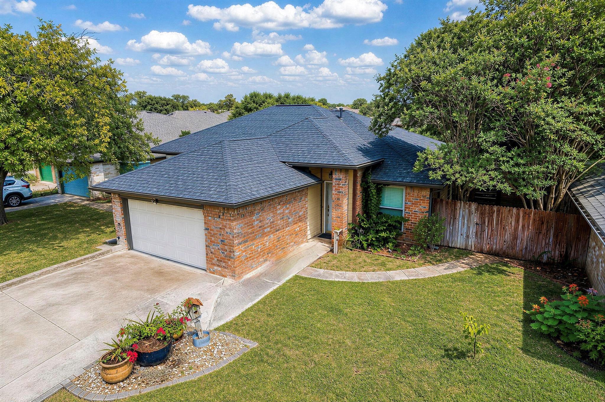 A classic brick exterior offers enduring charm wi