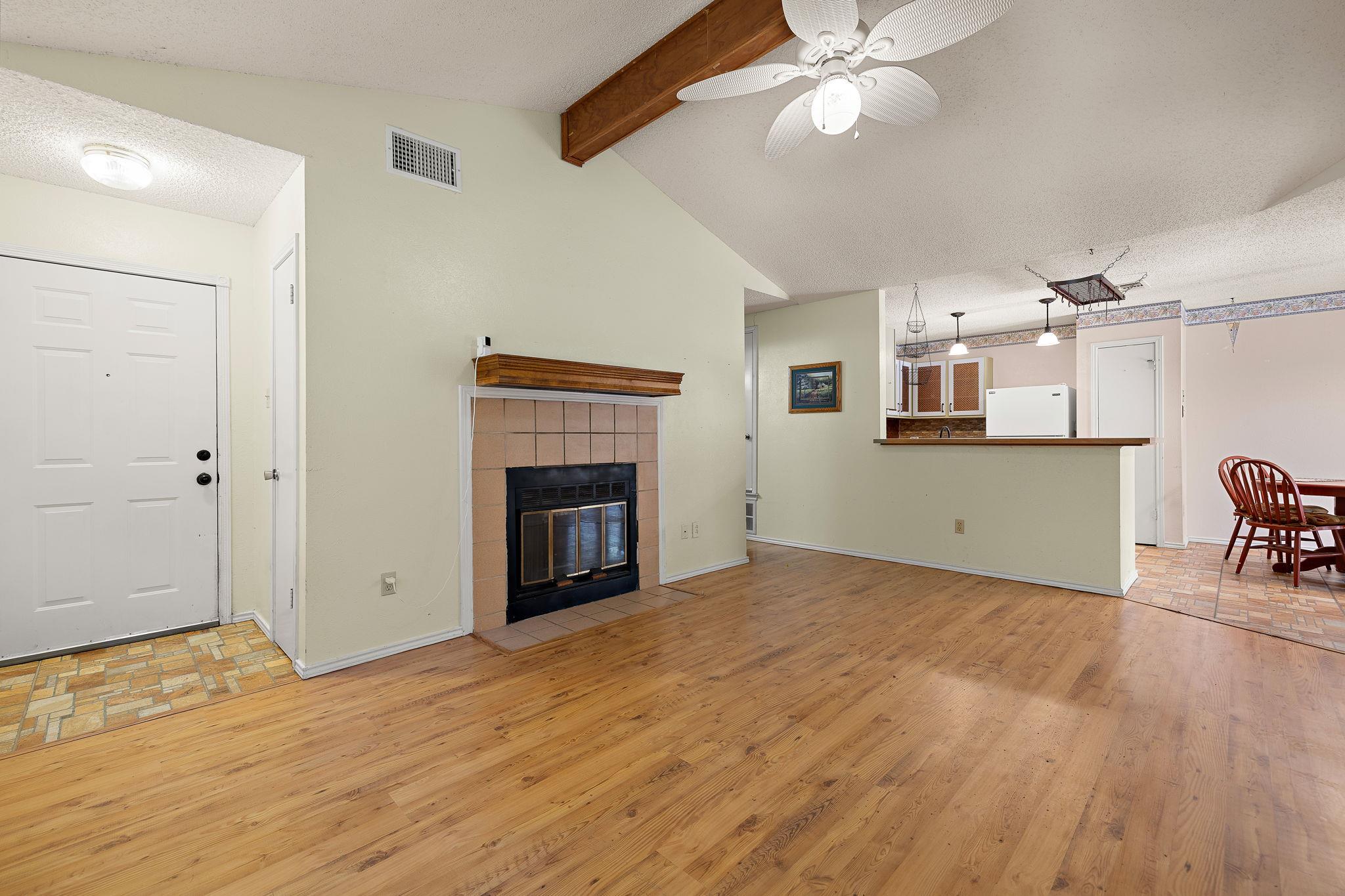 A welcoming entryway transitions into a spacious 