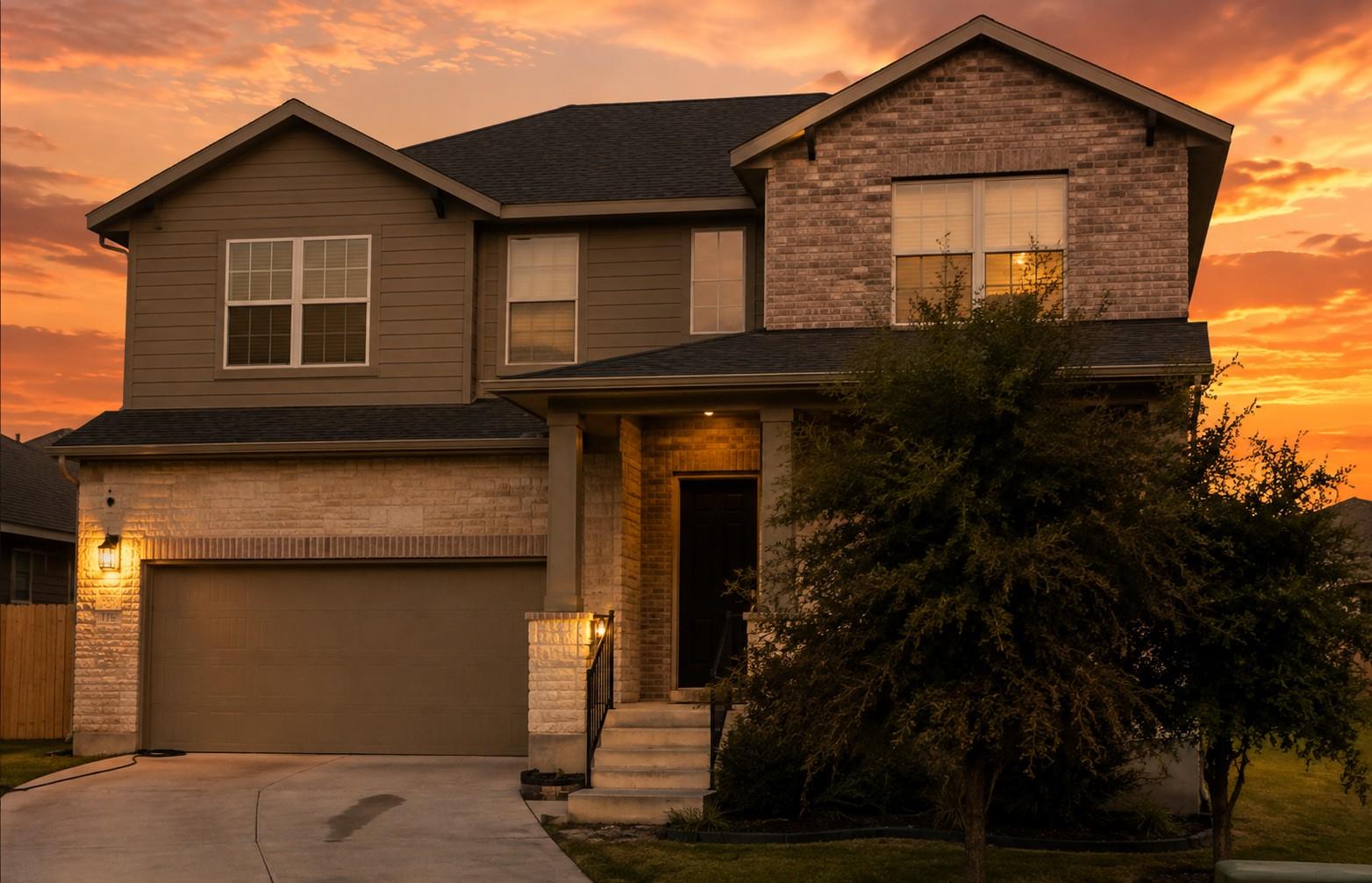 Textured brick accents and a multi-gabled rooflin