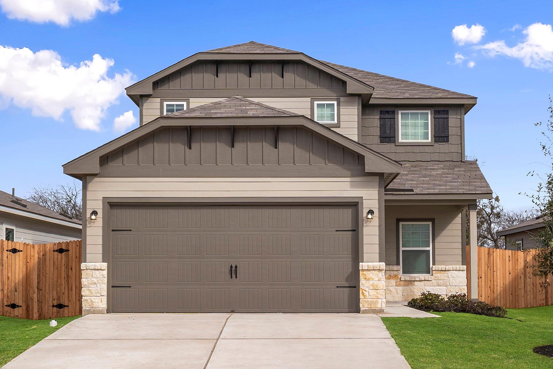 Craftsman-style home featuring stone siding, a sh