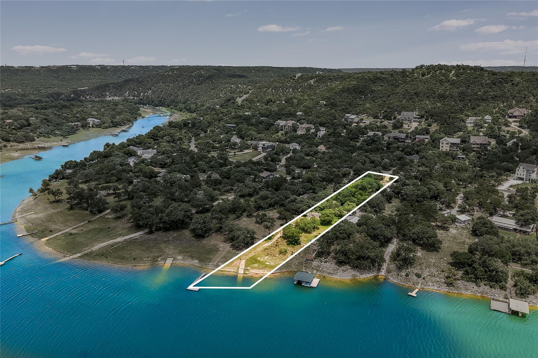 A premier waterfront lot offers direct lake acces
