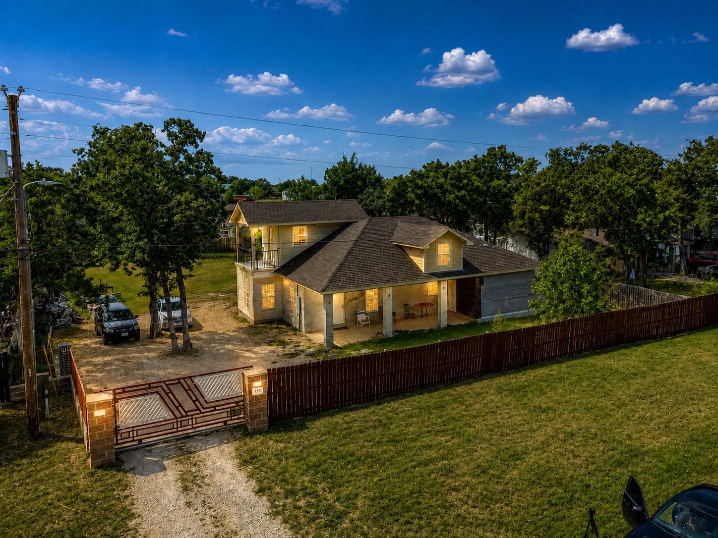 A private gated entry opens to this charming resi