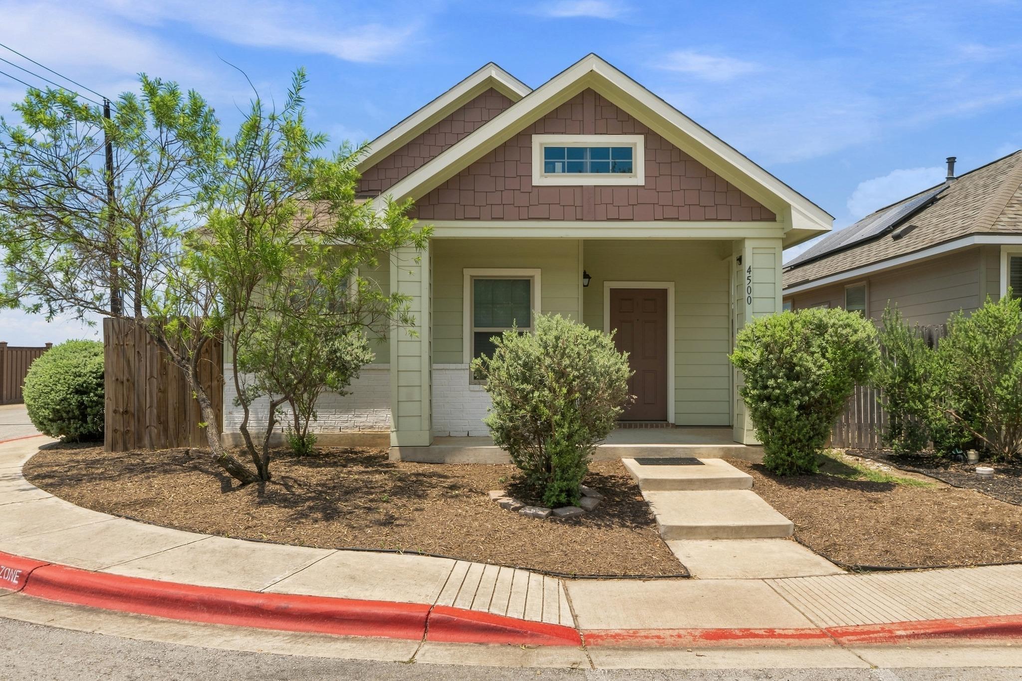 A welcoming front facade with a covered entry and