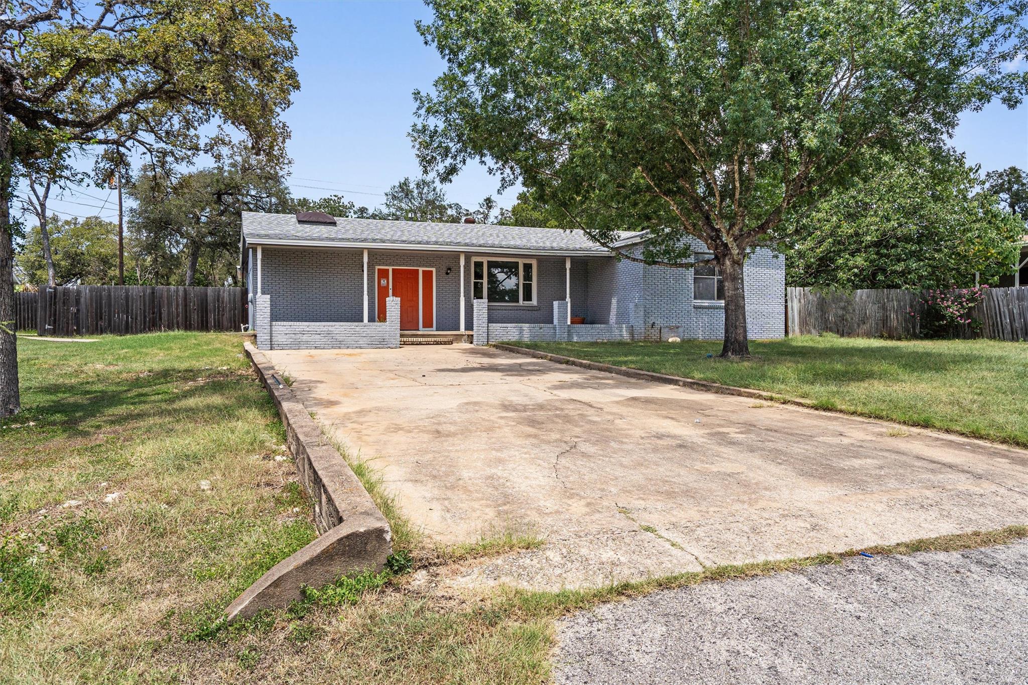 A classic brick exterior with a welcoming porch a