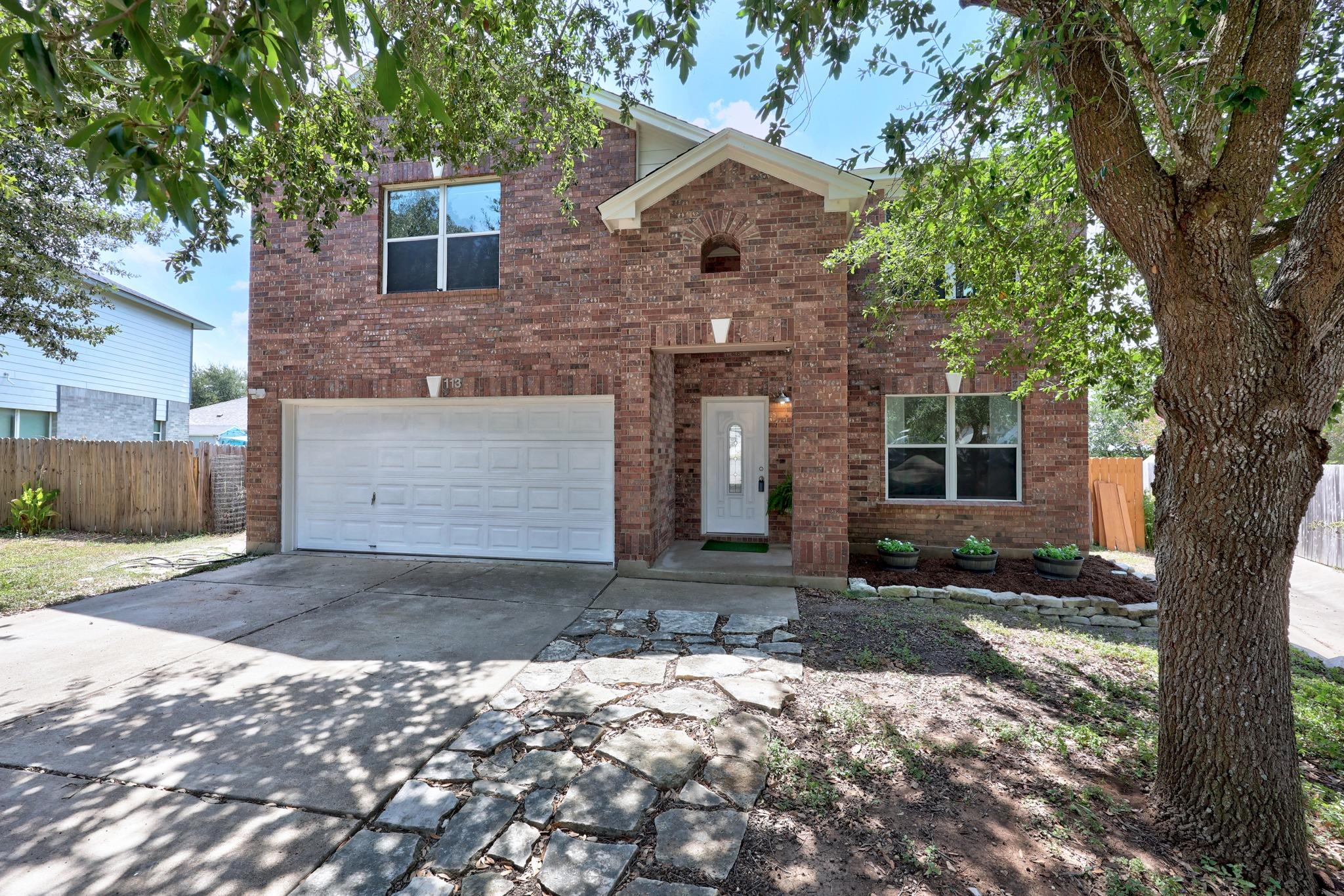 A classic brick facade welcomes guests, complemen