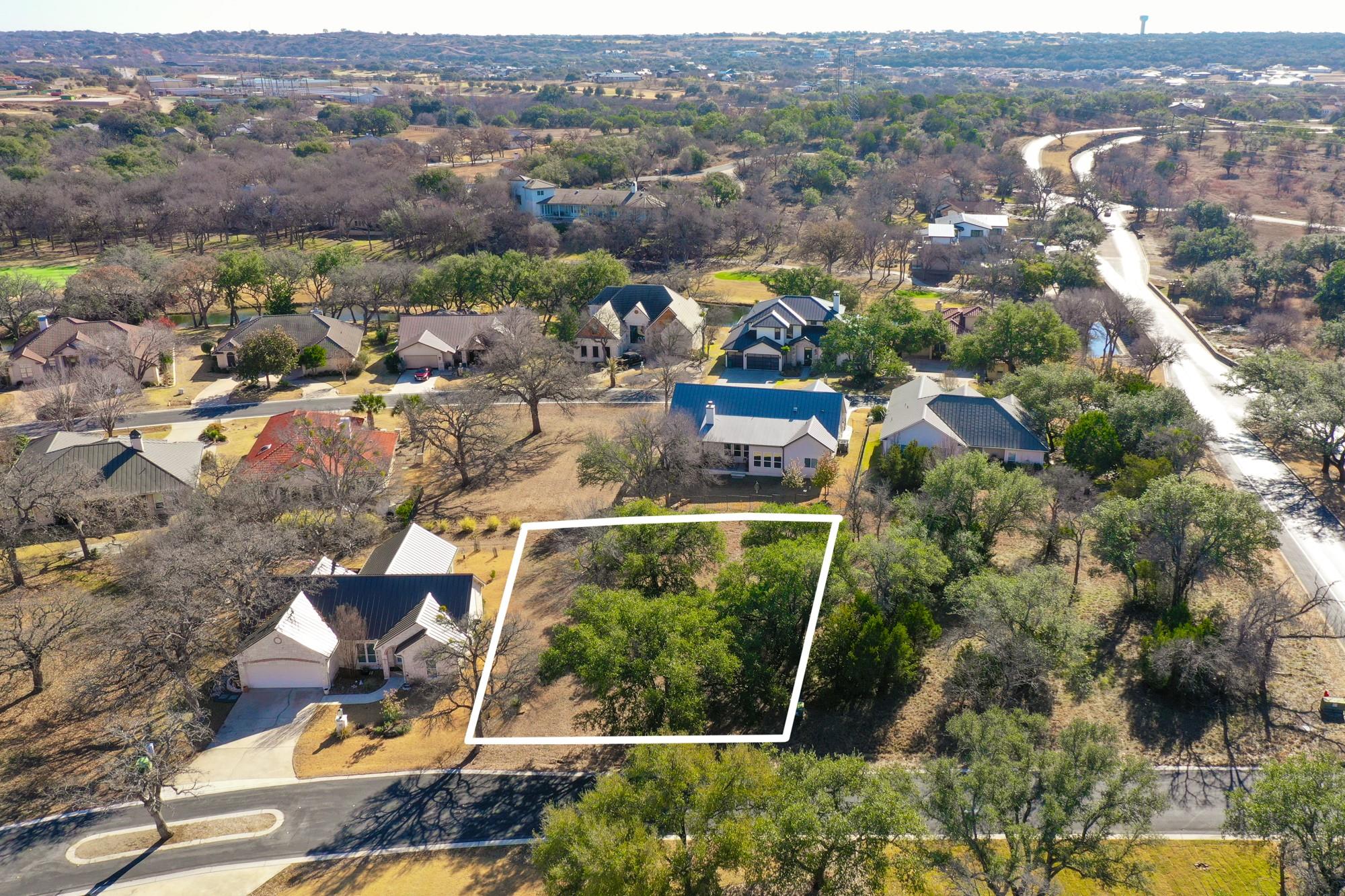 Aerial perspective of suburban area with property