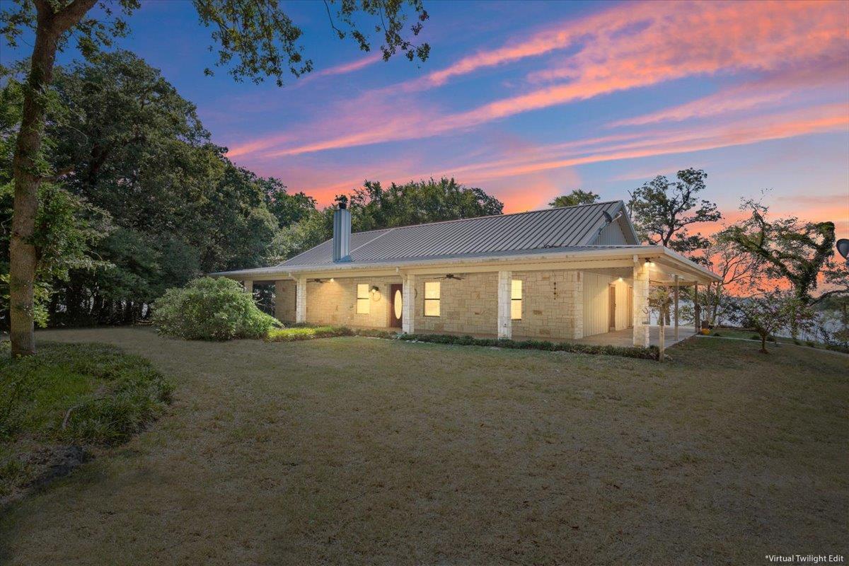 A picturesque stone residence awaits, boasting a 